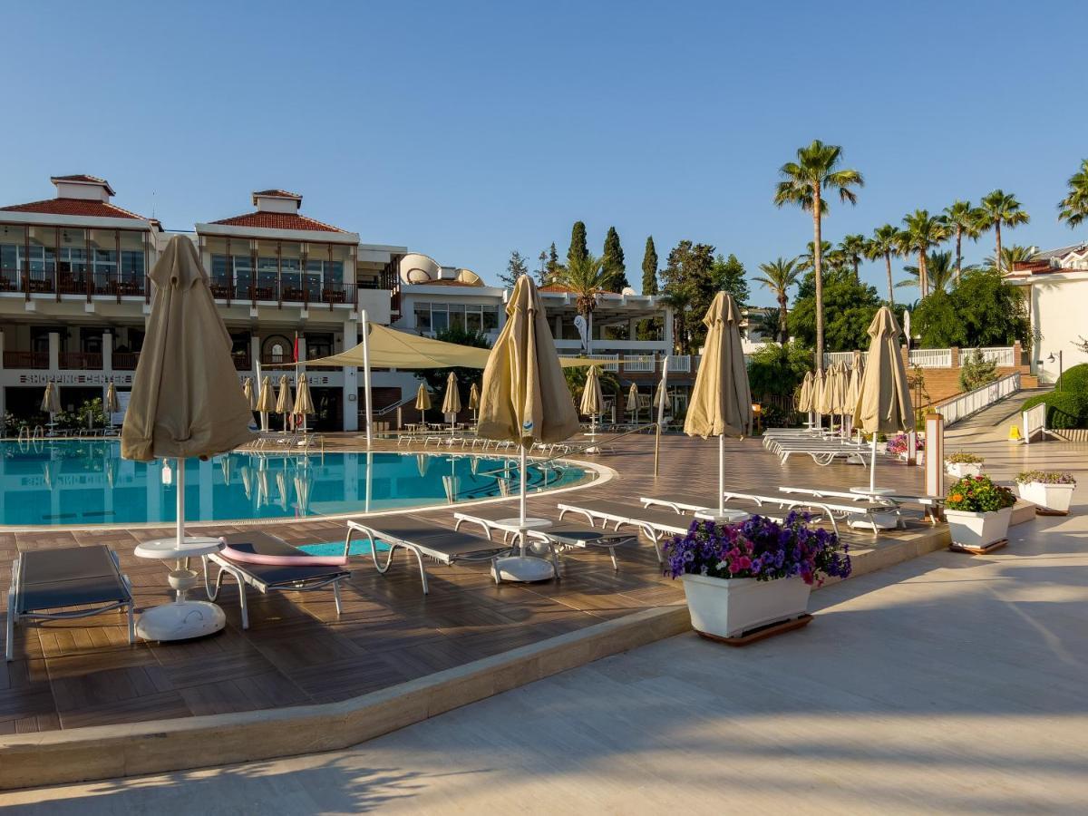 Aqi Hydros Club Hotel Kemer Exterior photo A pool at a hotel in Turkey