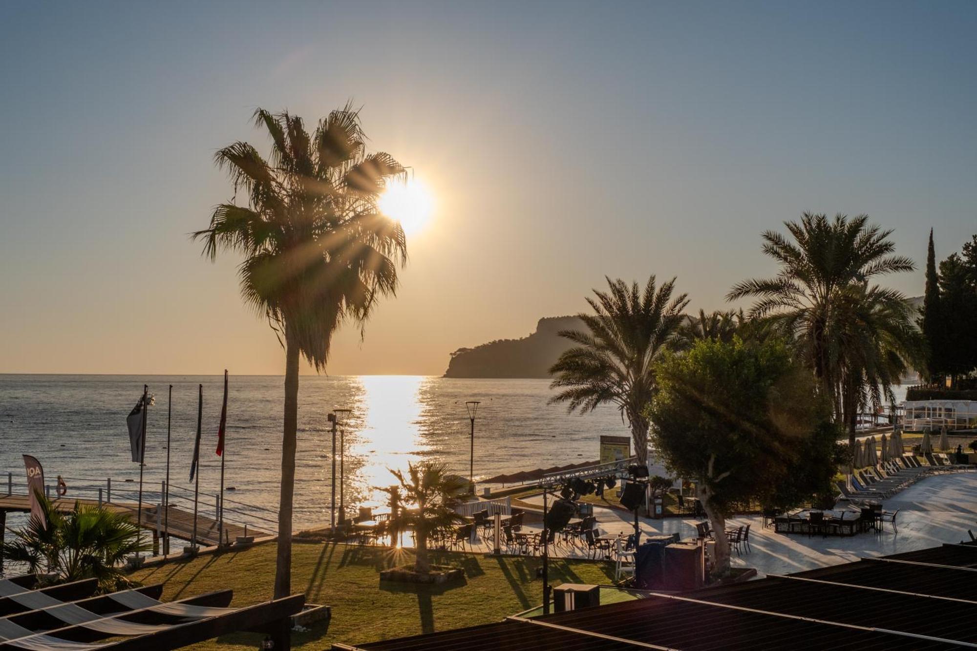 Aqi Hydros Club Hotel Kemer Exterior photo Sunset at the beach